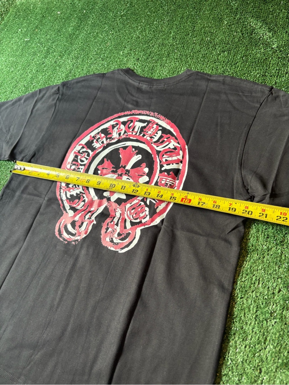 Black Short-Sleeve Men's Graphic Tee with Pink Accent - Picture 6 of 6